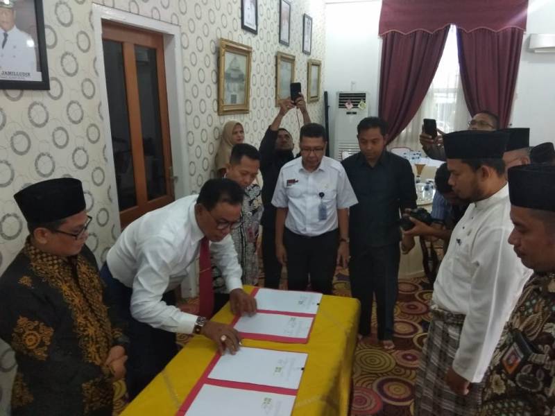 Bupati Suyatno Tanda Tangani NPHD Pilkada Rokan Hilir 36 Milyar