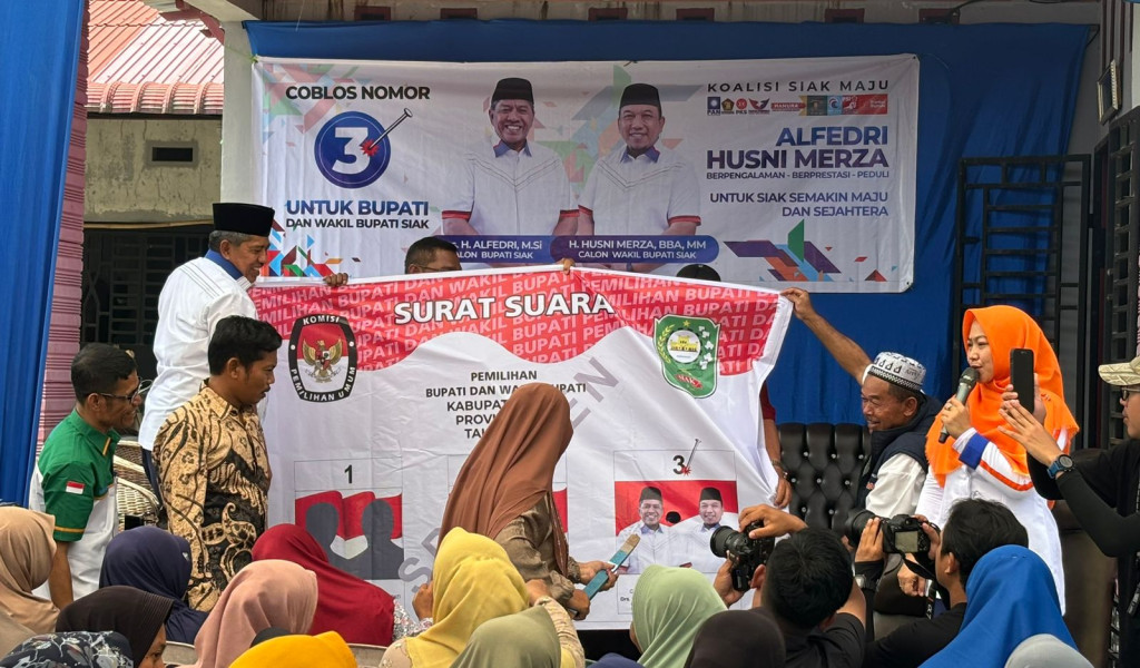 Beri Edukasi, Alfedri-Husni Ajak Warga Siak Coblos Nomor 3