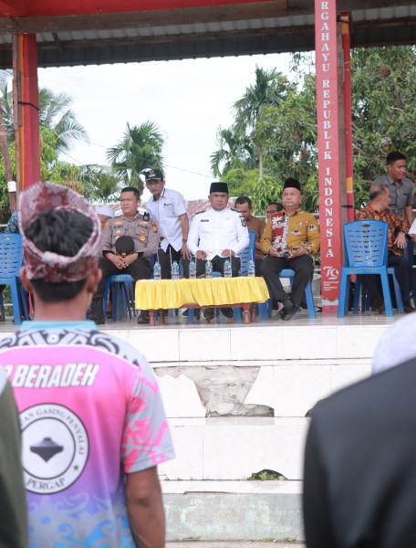 Bupati Zukri Sebut Gasing  Permainan Rakyat yang Harus Dilestarikan