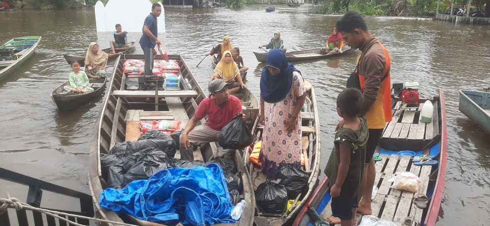 EMP Bentu Limited Berikan Bantuan Sembako untuk Korban Banjir di Empat Lokasi