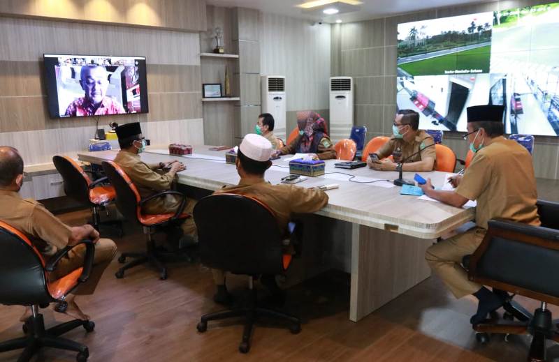 Vidcon Dengan Kasatgaswil V KPK, Pj Sekda Paparkan Persiapan Penganggaran Penanganan Covid 19