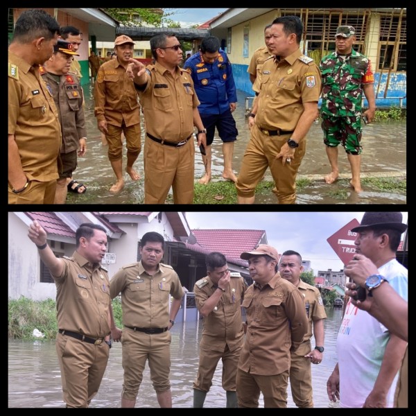 Hari pertama masuk kerja, Wabup Husni Tamrin Tinjau Banjir di SMP 1 dan Jalan Pemda Pangkalan Kerinci