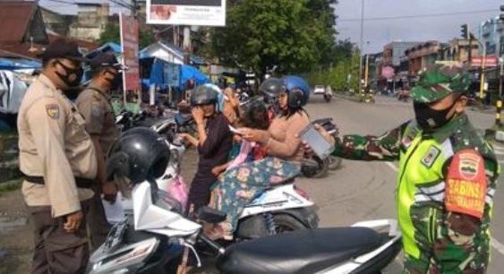 Warga Wajib Prokes, Sertu Afrisal Jaring 2 Warga Tidak Gunakan Masker