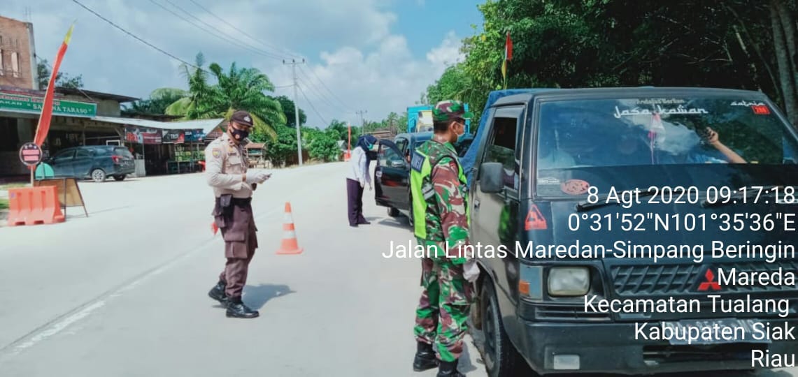 Antisipasi Covid-19, Serda Sarju Data Warga Yang Masuk Siak
