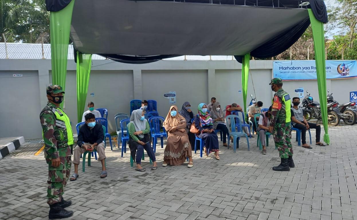 3 Warga Terjaring Tidak Pakai Masker, Sertu TH Hutagalung Ingatkan Warga Agar Patuhi Prokes