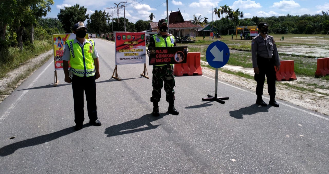 Jalan Utama Pangkalan Pisang Diperiksa Ketat, Masyarakat Wajib Pakai Masker