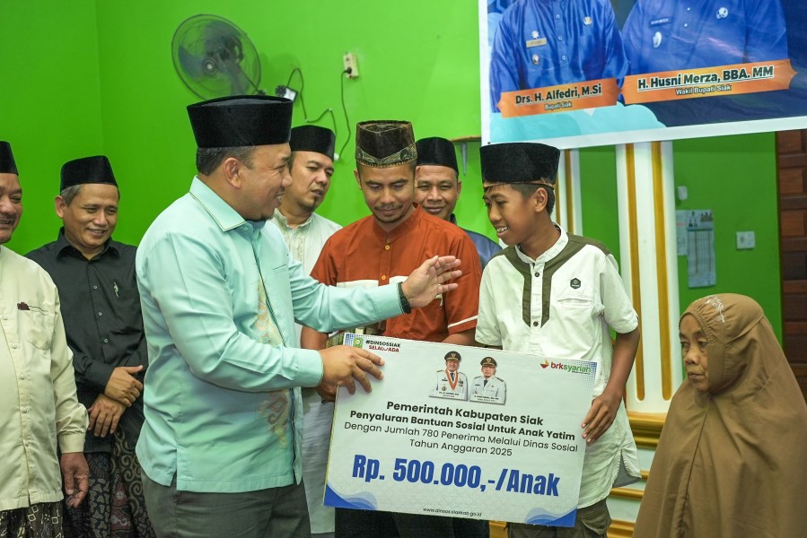 Safari Ramadhan di Pusako, Wabup Husni Merza Berikan Santunan Anak Yatim dan Paket Ramadhan Bahagia BAZnas Siak