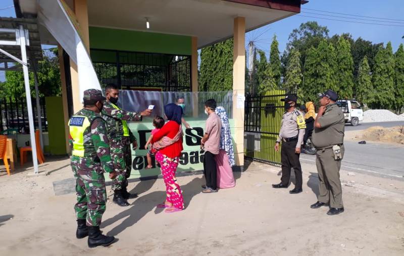 Sertu Abdon Pardosi Minta Masyarakat Gunakan Masker Saat Berobat