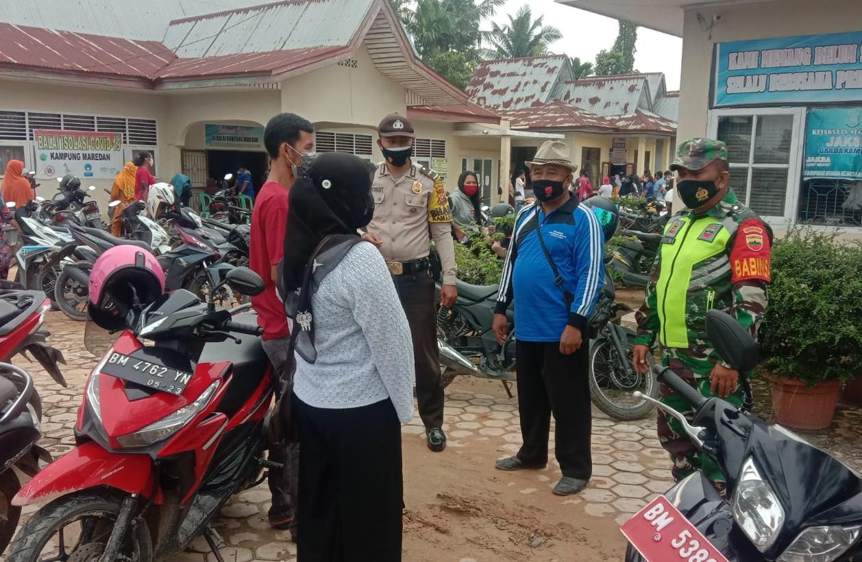 Lakukan Komsos, Sertu Uuk Sudarijanto Ingatkan Warga Ikuti Prokes
