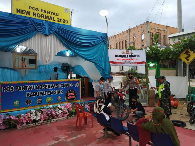Sambut Hari Bhayangkara ke 74, Lengkap Menggunakan Masker dan Helm Dapat Service Gratis