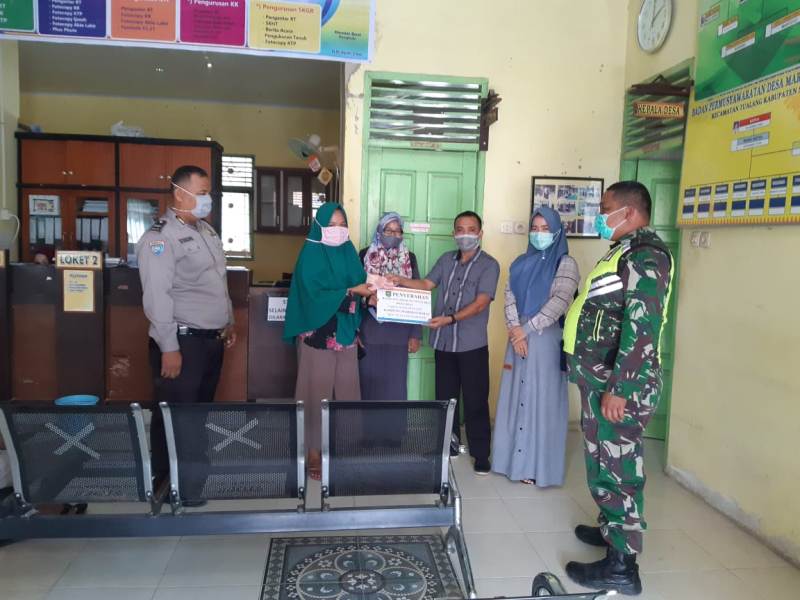 Pelda Ramli Nasution Dampingi Penghulu Salurkan BLT-DK Untuk 71 KK Warga Maredan Barat
